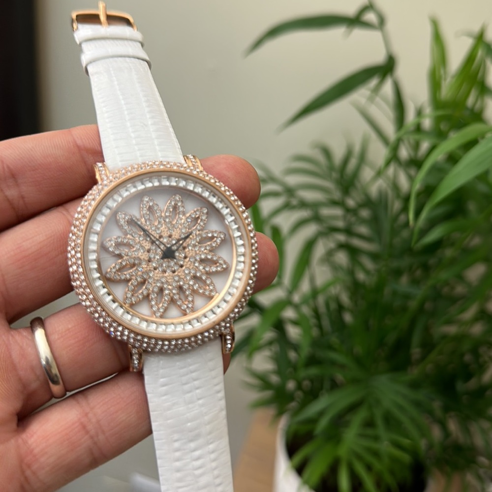 Rose Gold Iced Out Crystal Spinning Dial Wristwatch for Women.
